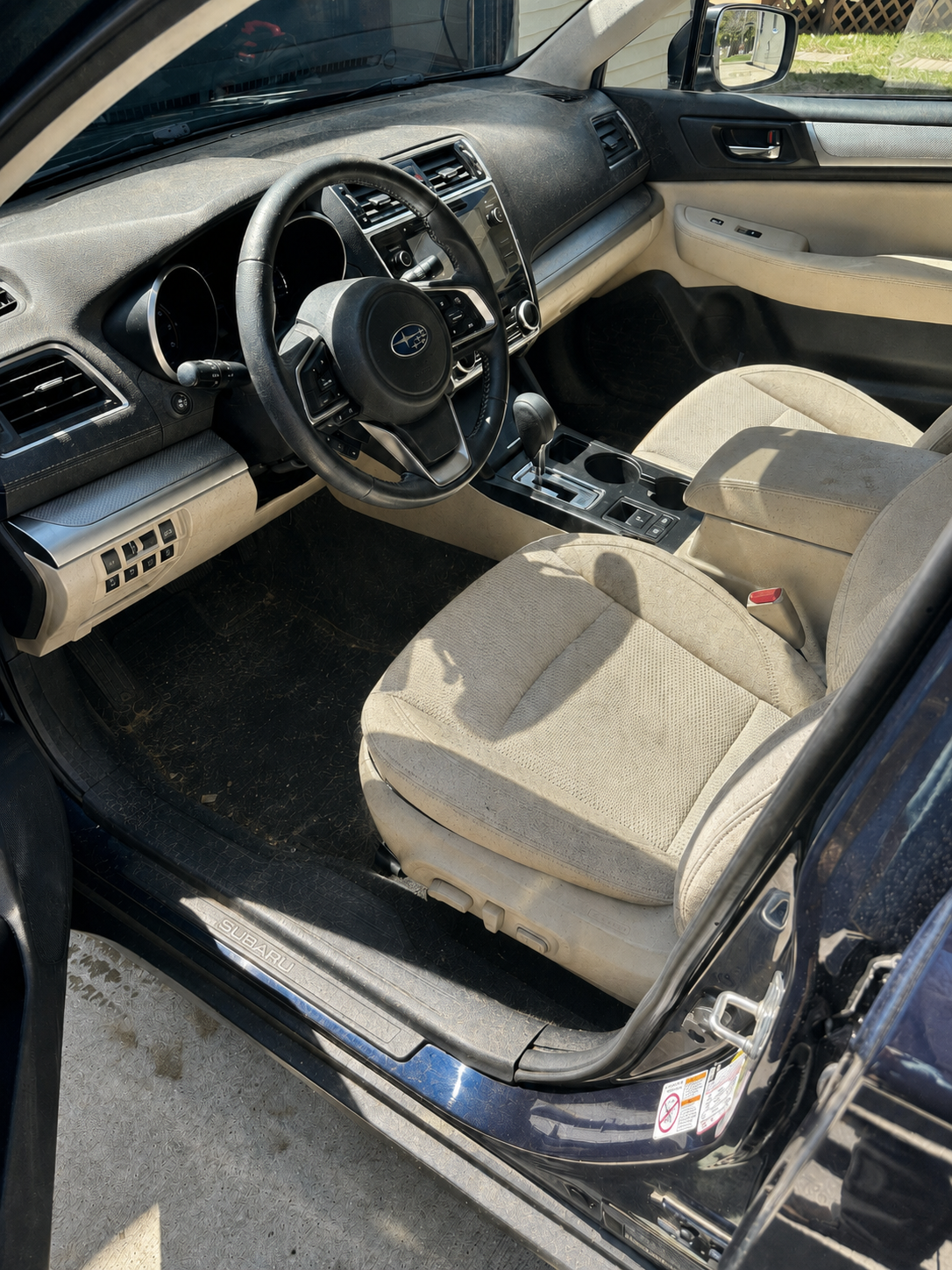 Subaru sedan interior detailing before and after — before